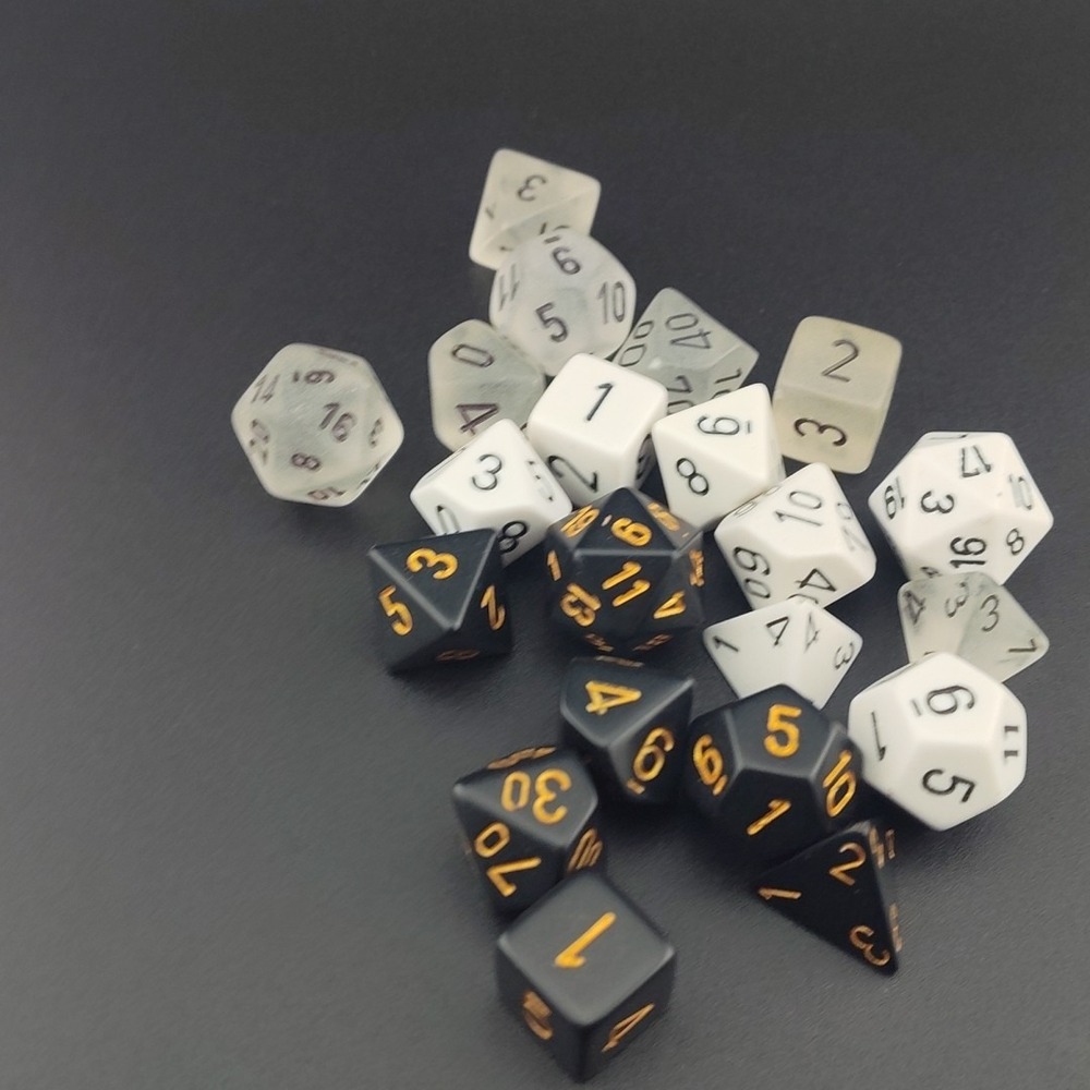 Chessex dice black gold white translucent game play RPG role hexagon triangle